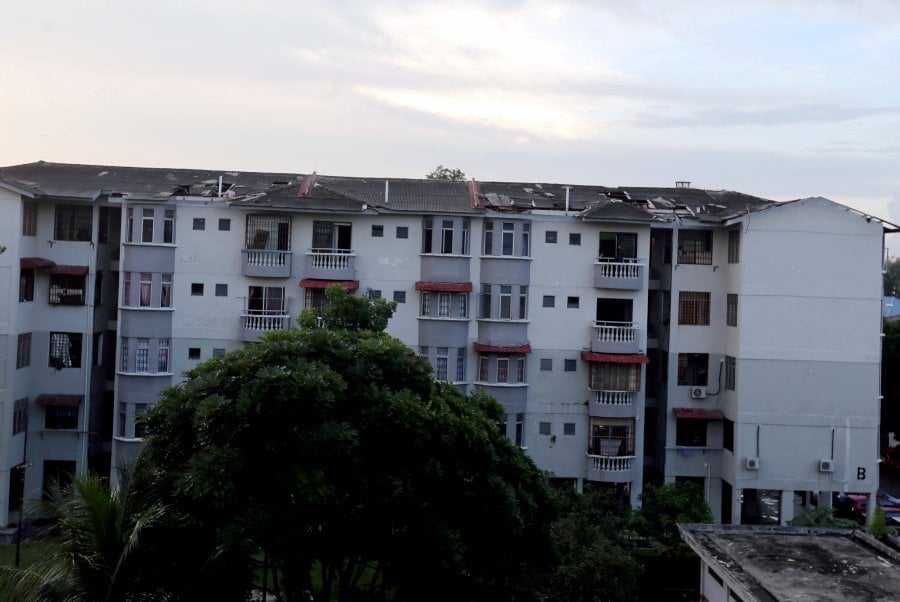 Some 100 residents suffered damages to their homes when a freak storm blew off the roof of their housing flats at the Lima Kedai public housing near Jalan Lima Kedai today.