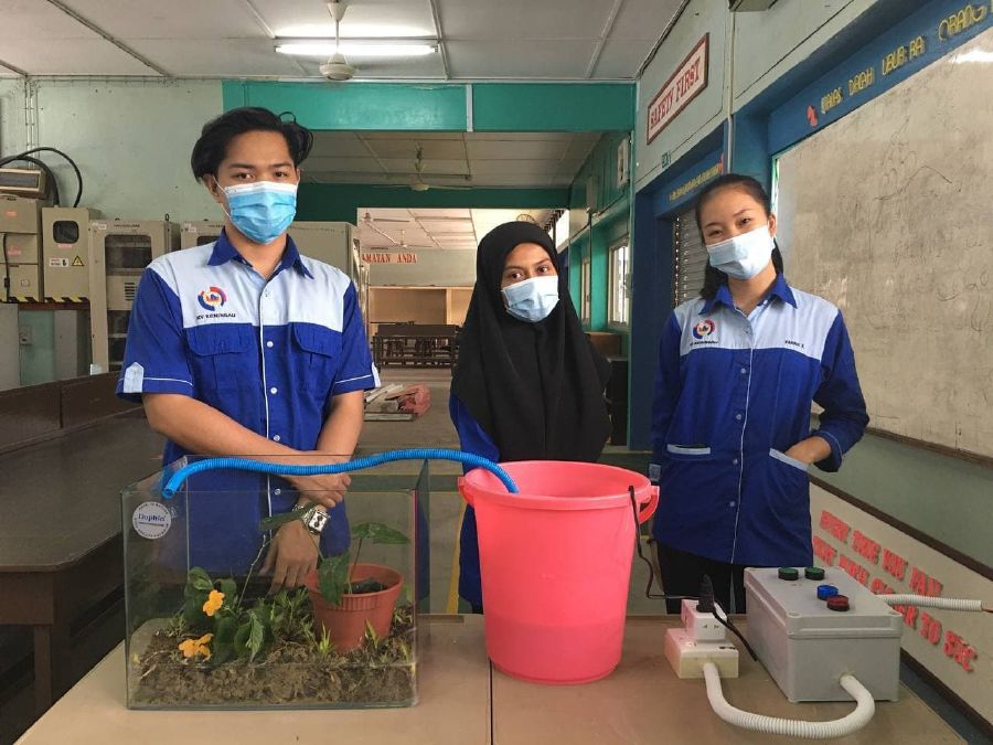 Keningau Vocational College students Warren Junior Patin, Andi Fazirah Usman, and Vannie Verus (from left) aims to win USD2,000 grant with their "Mechanical Water Veins" in upcoming international Haquathon 2.0 online pitching competition. - Photo courtesy of Keningau Vocational College