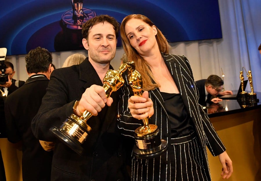  Arthur Harari and French film director and screenwriter Justine Triet attends the 96th Annual Academy Awards Governors Ball after winning the Oscar for Best Original Screenplay for "Anatomy of a Fall" at the Dolby Theatre in Hollywood, California. - AFP PIC