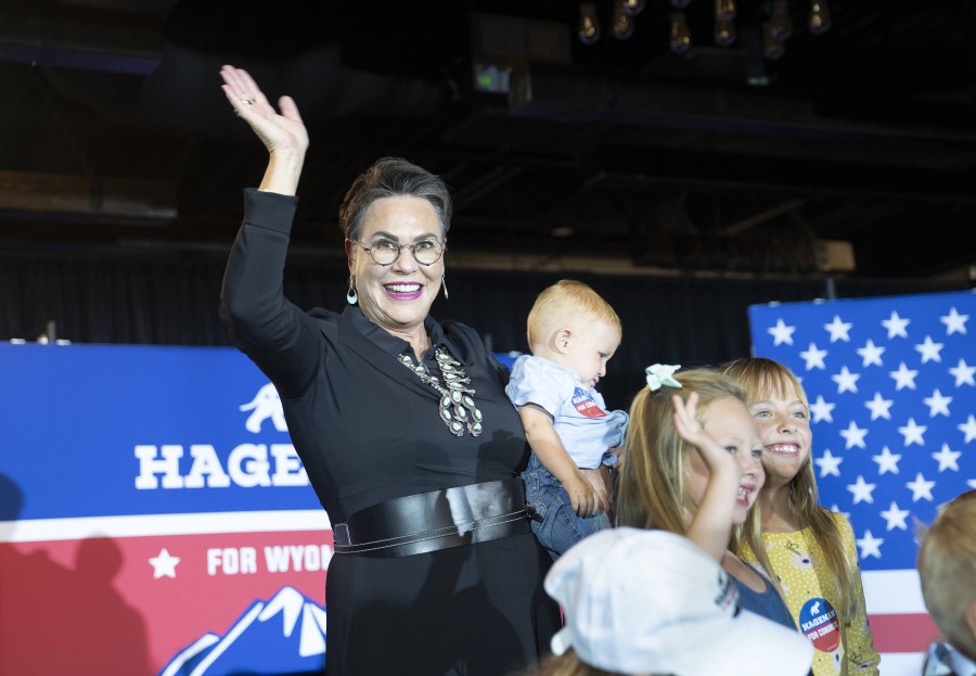  Wyoming Republican congressional candidate Harriet Hageman waves as she takes a picture with children during a primary election night party on August 16, 2022 in Cheyenne, Wyoming. - AFP PIC