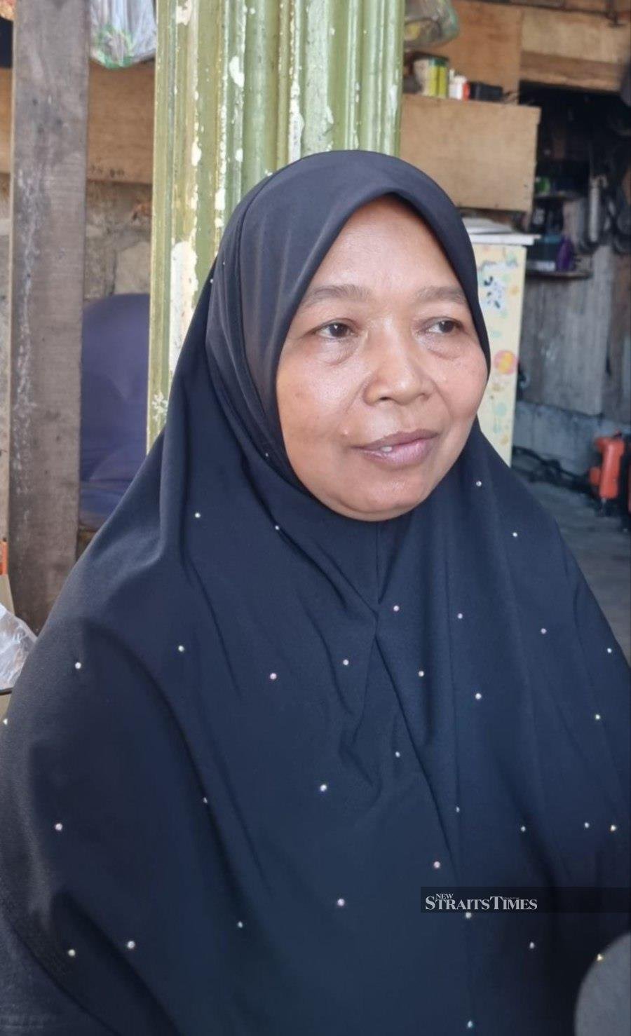 Zainun Mat Amin said that her grandson Muhamad Abeel Qaiz Faizal Fazrin was playing inside a car with his twin and two other siblings days before he died due to heat stroke. Pic by Sharifah Mahsinah Abdullah