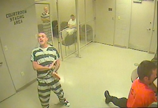 Authorities say several inmates at a Texas jail broke out of a holding cell to help save an armed guard after they saw him lose consciousness. Pix from www.wfaa.com