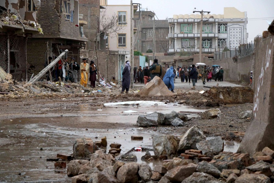 Afghan Security Forces inspect the scene of an attack a day after a car bomb went off in Herat, Afghanistan. - EPA pic