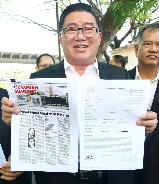 Parti Cinta Malaysia vice-president Datuk Huan Cheng shows a copy of the police report made. Pix by AMIR IRSYAD OMAR.