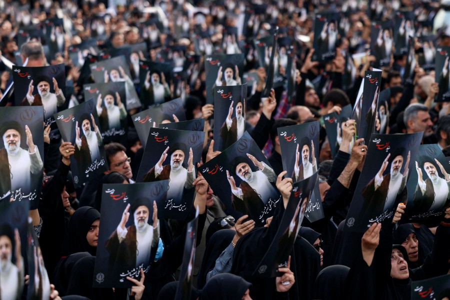 Iranians gather at Valiasr Square in central Tehran to mourn the death of President Ebrahim Raisi and Foreign Minister Hossein Amir-Abdollahian in a helicopter crash the previous day. - AFP PIC