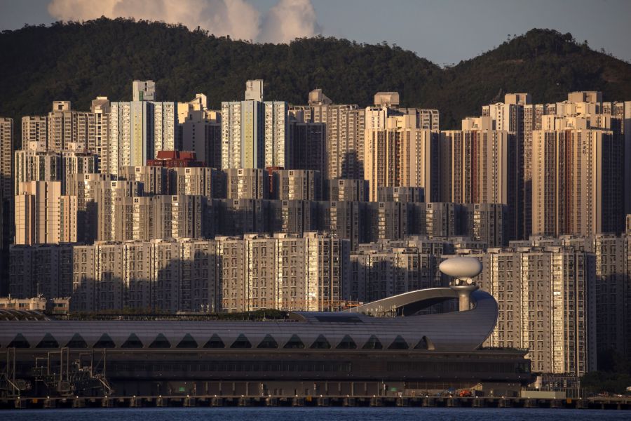 The Kai Tak Cruise Terminal and residential buildings in Hong Kong, China, on Wednesday, May, 26, 2021. Hong Kong's unemployment rate fell for a second straight month in April as the city slowly emerges from an extended slump fueled by the pandemic and social unrest. Photographer: Paul Yeung/Bloomberg
