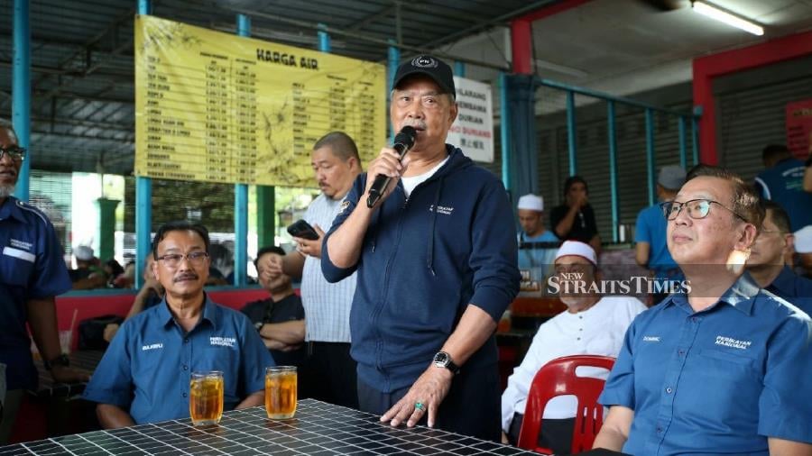 Perikatan Nasional (PN) chairman Tan Sri Muhyiddin Yassin has just learned from news reports that former Cabinet minister Datuk Seri Mustapa Mohamed is no longer a Bersatu member. Pic by MIKAIL ONG