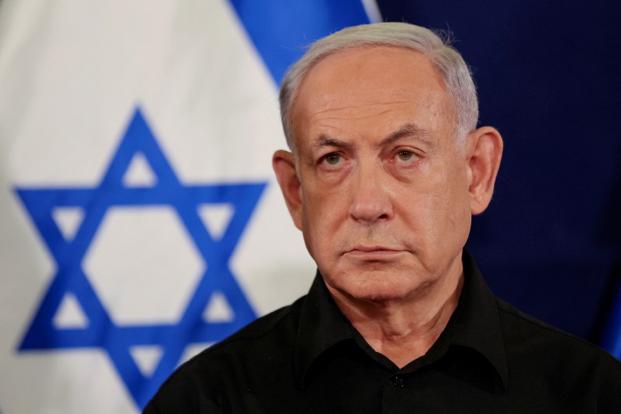 Israeli Prime Minister Benjamin Netanyahu holds a press conference with Defense Minister Yoav Galant and Cabinet Minister Benny Gantz (not pictured) in the Kirya military base in Tel Aviv , Israel , 28 October 2023. - REUTERS pic