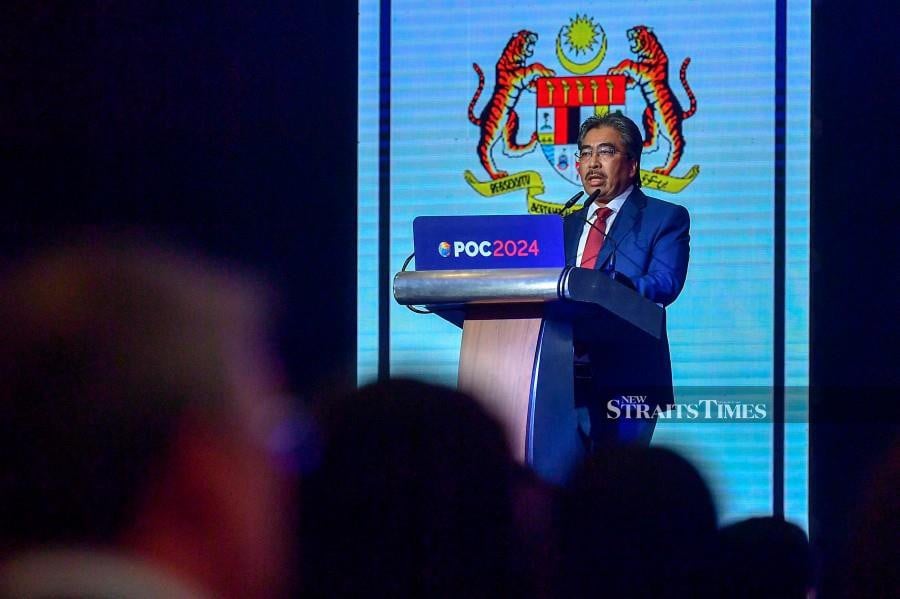 Plantation and Commodities Minister Datuk Seri Johari Abdul Ghani delivers his speech during the Palm and Lauric Oils Price Outlook Conference and Exhibition (POC2024) --fotoBERNAMA (2024) 