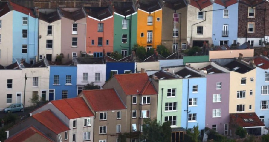 Painted rows of houses are seen in Bristol, Britain, August 11, 2023. REUTERS/Toby Melville/File Photo