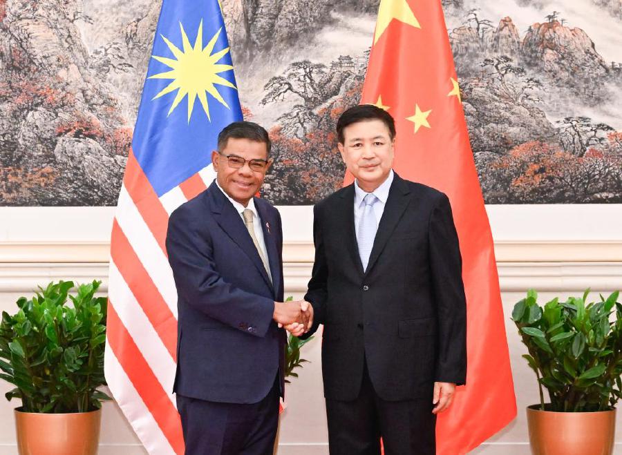 The meeting was co-chaired by Home Minister Datuk Seri Saifuddin Nasution Ismail and Chinese State Councilor and Minister of Public Security Wang Xiaohong.- PICS COURTESY: Xinhua News Agency