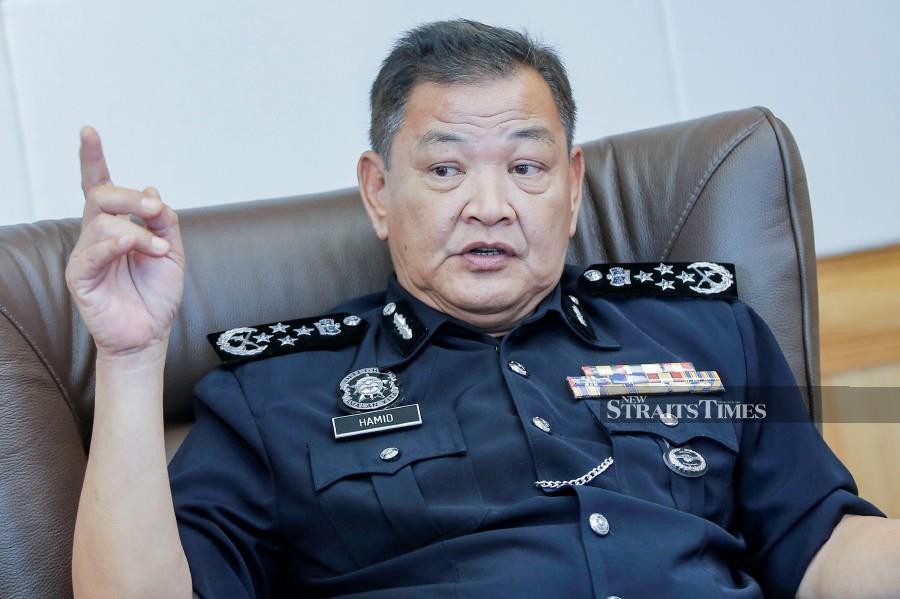 Inspector-General of Police Datuk Seri Abdul Hamid Bador says under his leadership, he and the Criminal Investigation Department (CID) director would target “the head” — crime lords and syndicate bosses. - NSTP/Aizuddin Saad 