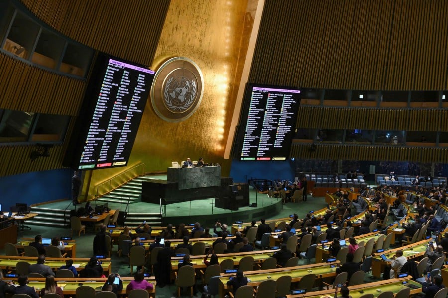 A general view shows a screen of votes during a United Nations General Assembly meeting to vote on a non-binding resolution demanding "an immediate humanitarian ceasefire" in Gaza at UN headquarters in New York. - AFP PIC