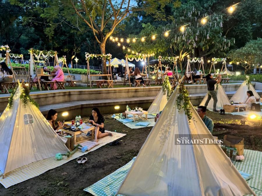 Attendees will be welcomed into a whimsical 'Garden Fairies' themed setting, complete with Instagram-worthy picnic setups featuring teepee tents and picnic benches adorned with floral arrangements and fairy lights.