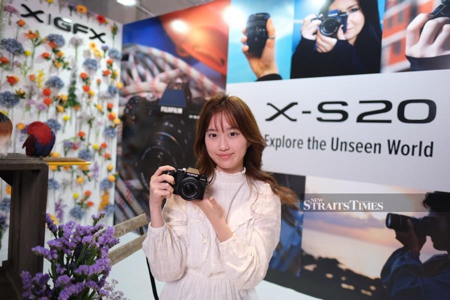 A model with the new Fujifilm X-S20.