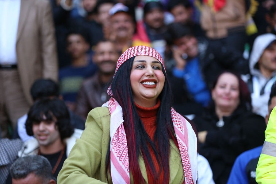  Iraqi TikTok celebrity Om Fahad is pictured at the Basra International Stadium during a match of the Arabian Gulf Cup football tournament on January 19, 2023. -AFP PIC
