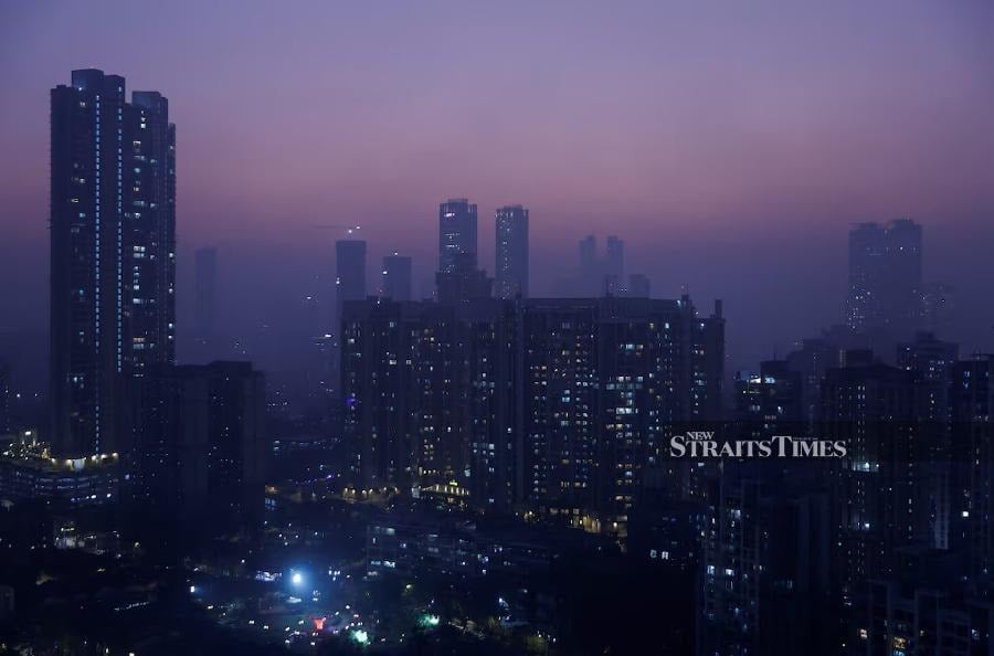 High-rise buildings are seen in Mumbai, India, January 5, 2024. REUTERS/Francis Mascarenhas/File Photo 