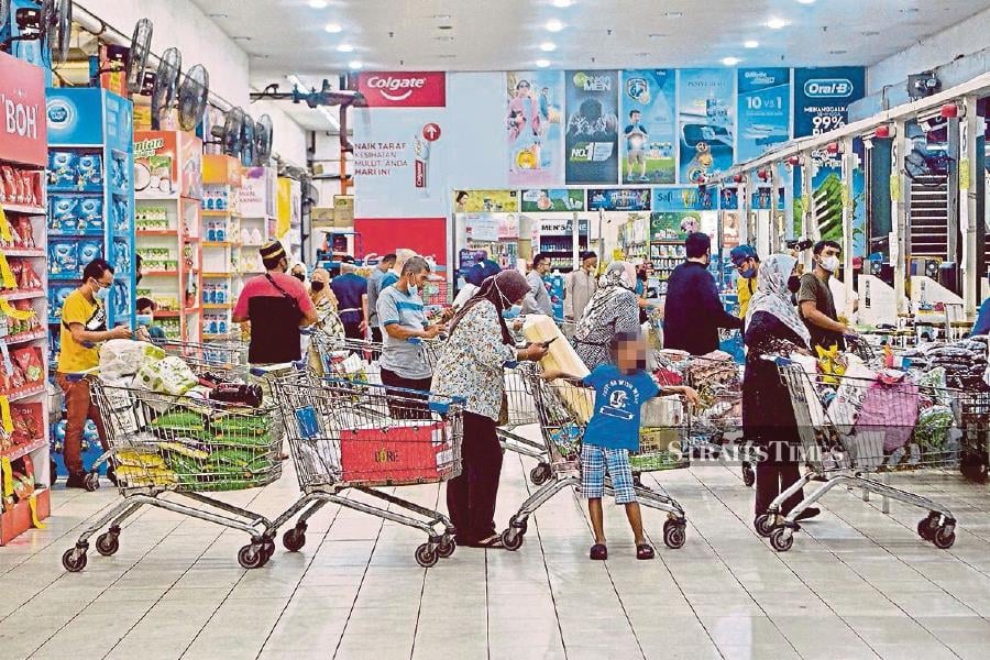 UOB Group global economics & markets research expects a steady rise in headline inflation in the coming months, after the February consumer price index surprised on the upside. STR/FAIZ ANUAR