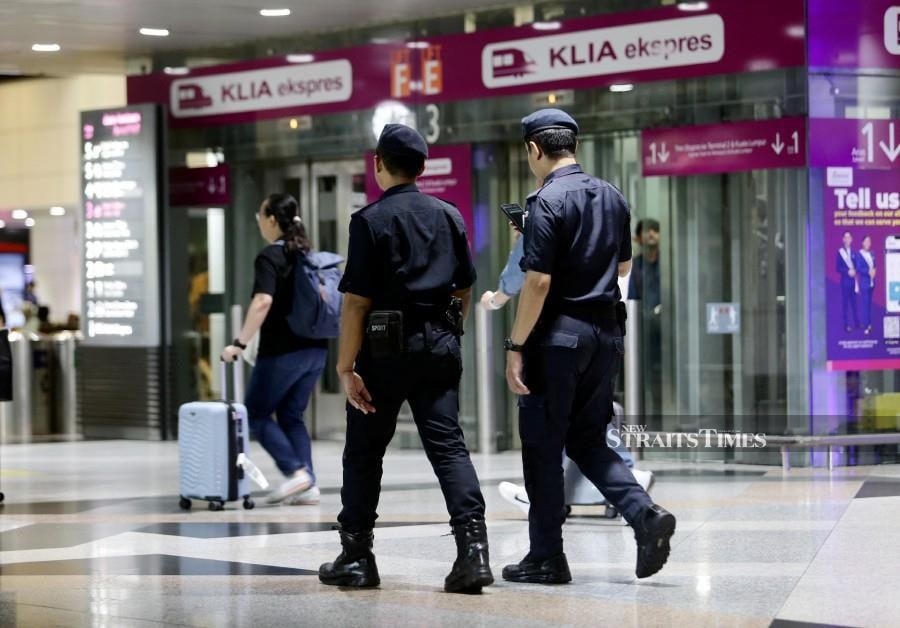 Security personnel seen making their rounds following the shooting incident at the Kuala Lumpur International Airport recently. -NSTP/MOHD FADLI HAMZAH