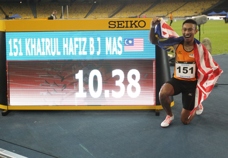 Khairul Hafiz Jantan poses for a photo after finishing the 100m race with a time of 10.387 seconds. Pic by YAZIT RAZALI