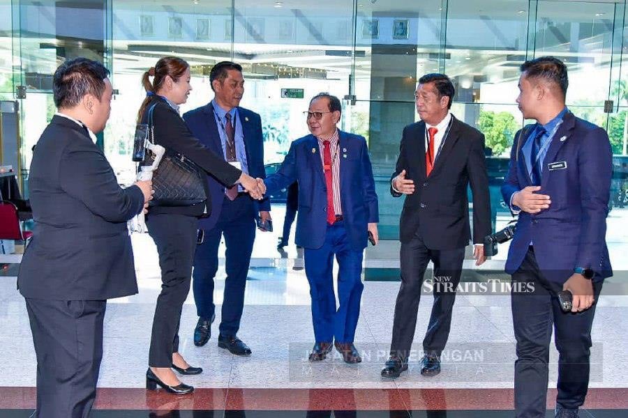 Sabah Deputy Chief Minister Datuk Seri Jeffrey Kitingan (third from right) at the state assembly building here today. Pic courtesy of Sabah Information Department
