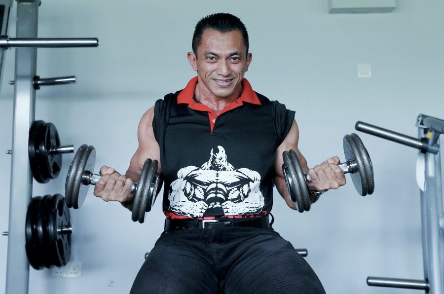 (file pix) Bodybuilder Sazali Samad, who is serving a four-year suspension for a doping offence, could land in trouble for taking part in an invitational tournament in Shanghai recently. NSTP/HASRIYASYAH SABUDIN