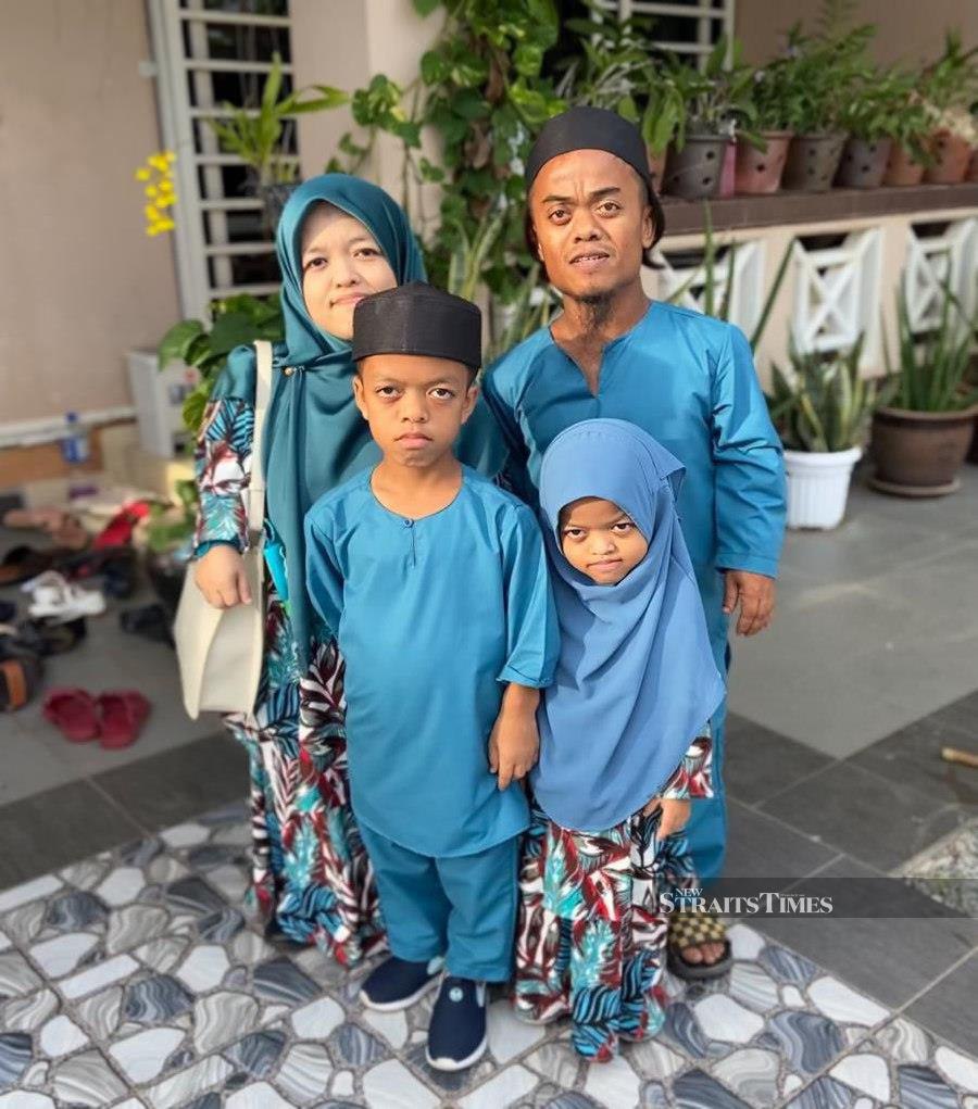 Mohd Afiq Fikri Firdaus Ibrahim counts his blessing when he found his soulmate and wife, Farihah Abd Ghani. With the couple are their children, Aufa Fakhriya and Muhammad Arfan. - Courtesy pic