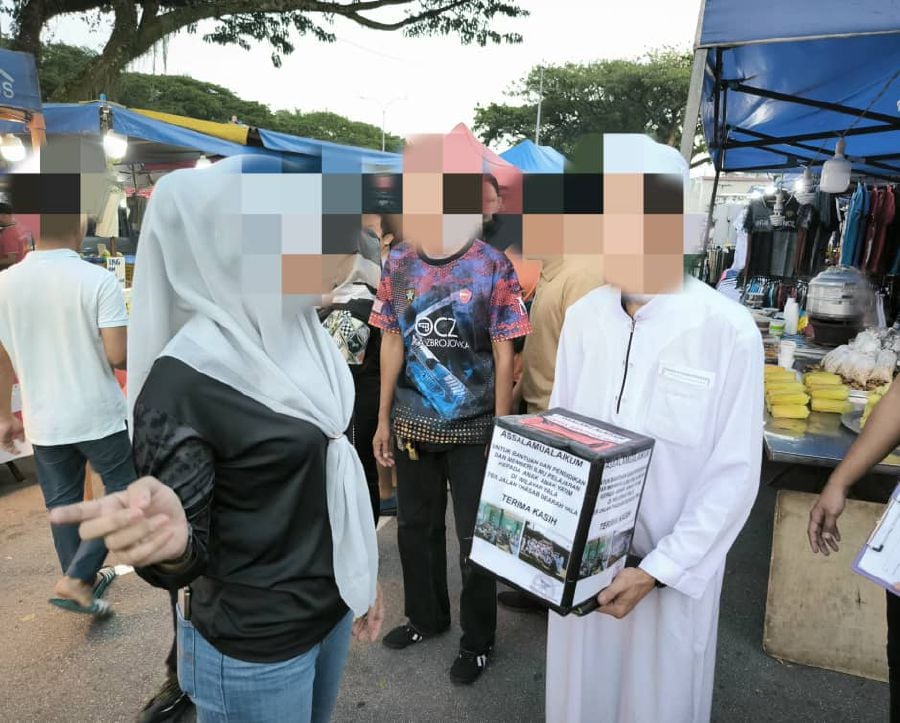 They claimed the donations would be channelled towards charity, and to build tahfiz schools. - Courtesy pic of Johor Immigration Department