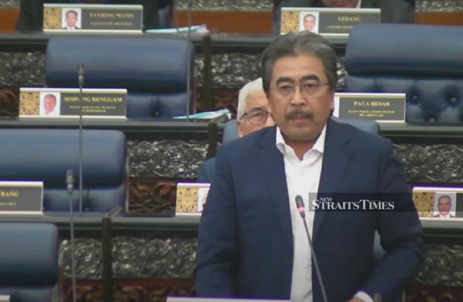  Datuk Seri Johari Abdul Ghani speaking during the Dewan Rakyat sitting this morning. 