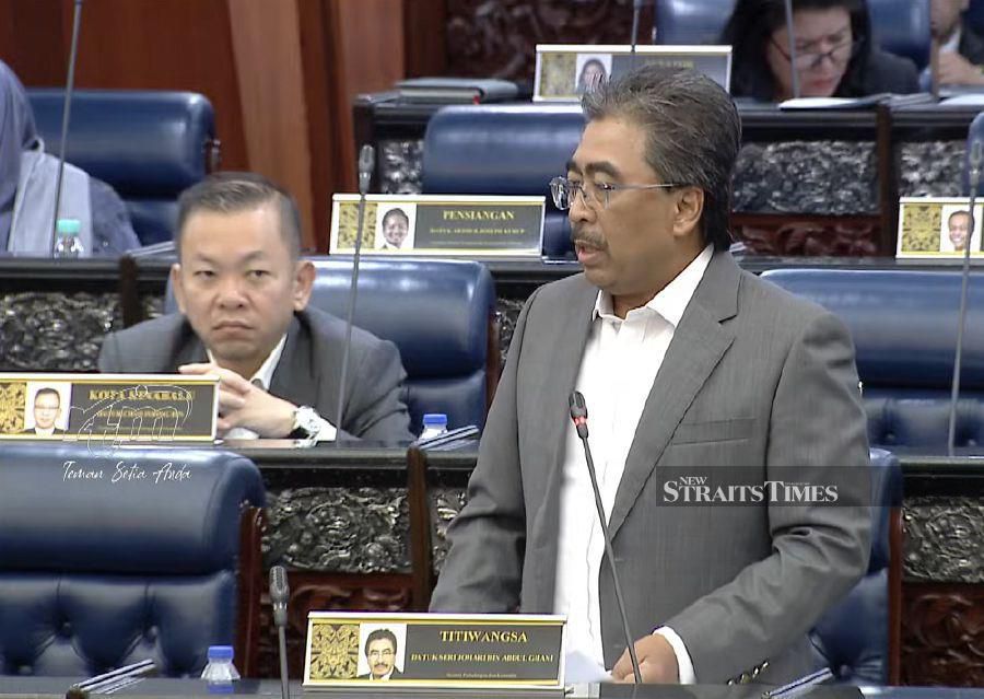 Plantations and Commodities Minister Datuk Seri Johari Abdul Ghani speaking during the Dewan Rakyat sitting this morning.