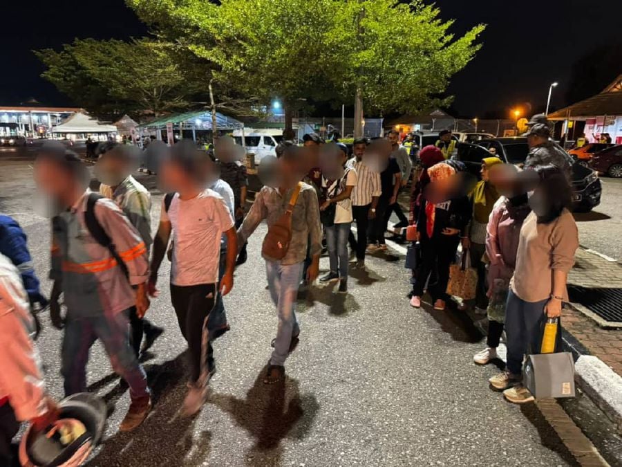 The crackdown on illegal migrants has been intensified in Johor, leading to the detention of 29 foreigners in Skudai and Pengerang yesterday. Pic courtesy of Johor Immigration Department.