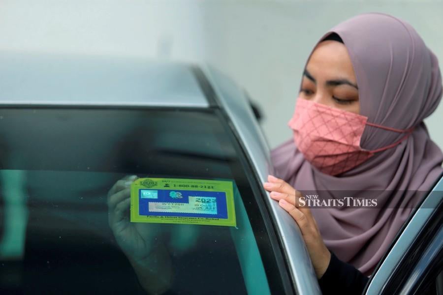 Loke said those who have chosen to go completely digital and not use the road tax sticker can print a copy of the digital road tax to keep in the car. - NSTP/ROHANIS SHUKRI