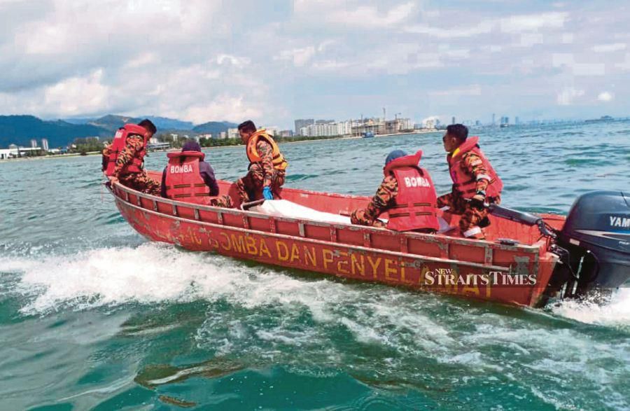The body of a man, believed to have jumped off the Penang Bridge last Sunday, was found near a ferry terminal. Photo courtesy of Fire and Rescue Department