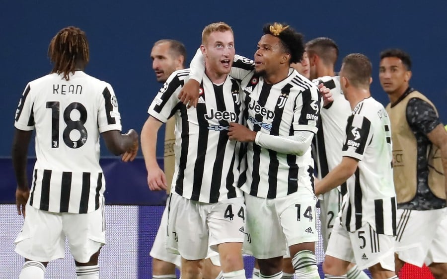  Dejan Kulusevski (C-L) of Juventus celebrates with teammates after scoring the opening goal against Zenit St. Petersburg at the Gazprom arena in St. Petersburg, Russia. -EPA PIC