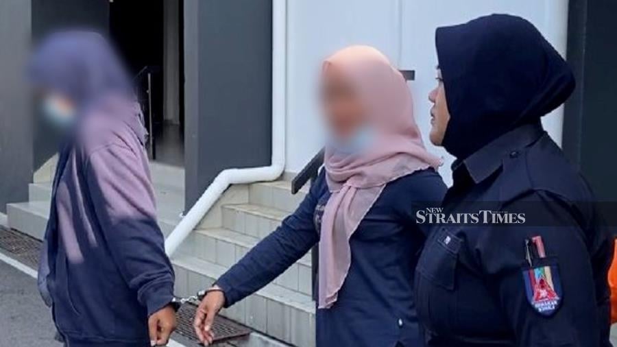 The elder sister of Bella was seen leaving the magistrate’s court once a one-day remand had been obstained.- Pic credit: NSTP/ALIAS ABD RANI