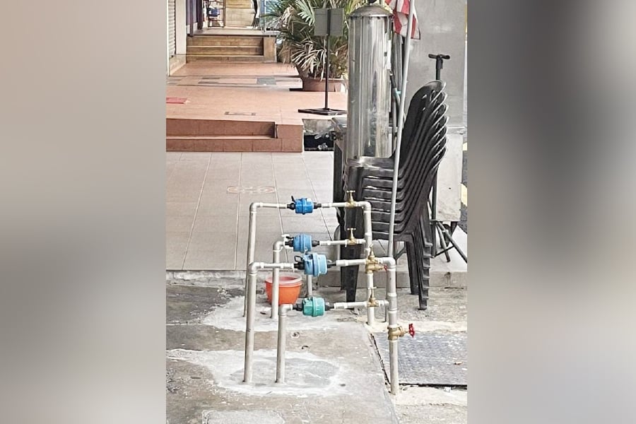 The installation of new water pipes and meters on a city walkway can endanger pedestrians. - Pic courtesy of Writer