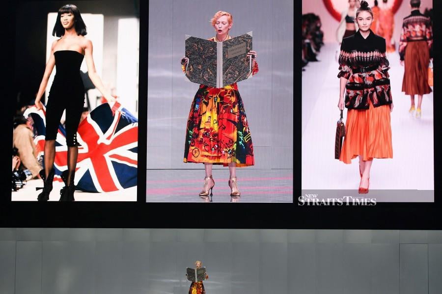 British actress and model Tilda Swinton performs on stage during the “Karl For Ever” event to honour late German fashion designer Karl Lagerfeld at the Grand Palais in Paris. (AFP)