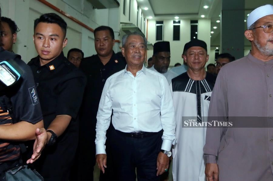 Tan Sri Muhyiddin Yassin arrives at  Pas Tarbiyah Centre in Gombak after the solat hajat event in Kuala Lumpur. - NSTP/HAIRUL ANUAR RAHIM