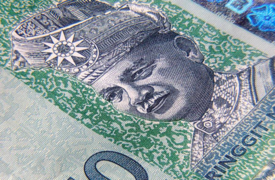 The ringgit opened marginally lower against the US dollar today as strong jobs data in the United States eased worries over a recession there, spurring demand for the greenback.