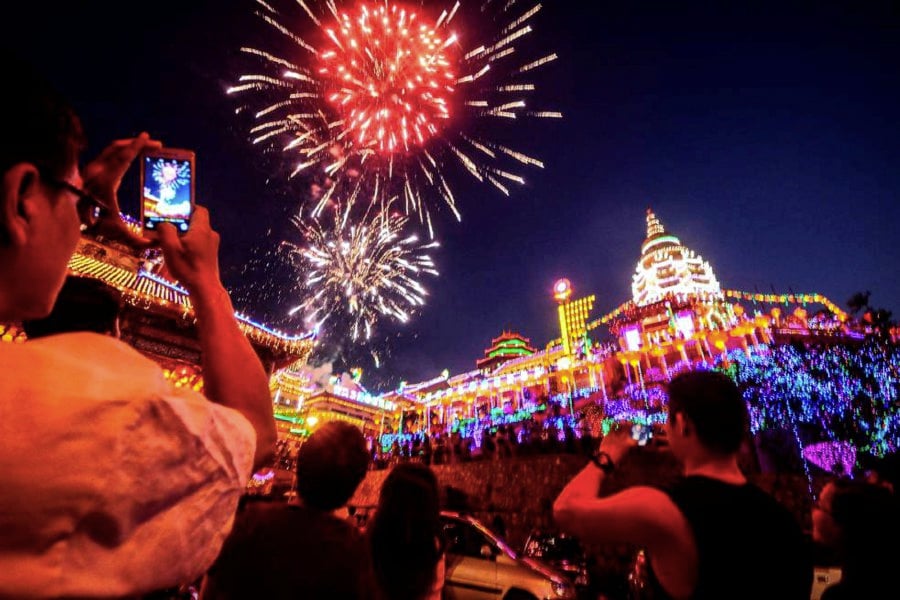 Some 20,000 traditional Chinese lanterns and thousands of modern neon and LED lightings set the 127-year-old biggest Buddhist temple complex in Southeast Asia aglow. To cap the magnificent evening, a spectacular display of fireworks lit the skies. Pic by STR/SHAHNAZ FAZLIE SHAHRIZALSHAHNAZ FAZLIE SHAHRIZAL