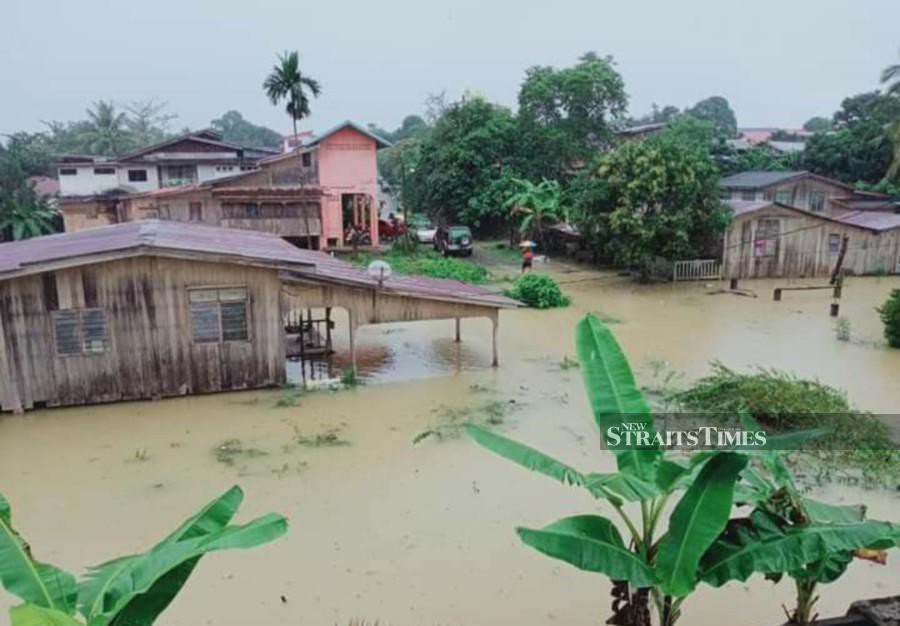  Several low-lying areas in Kuala Krai were inundated by floodwater. - NSTP/Courtesy of NST reader.