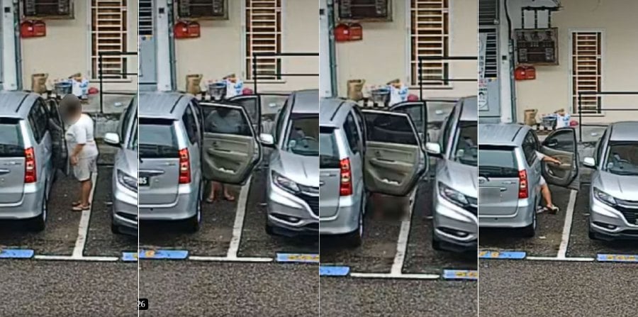 In the video shared on Facebook, a woman can be seen opening a car’s front and rear doors for protection before squatting to relieve herself. - Pic credit 新山Bukit Indah大小事