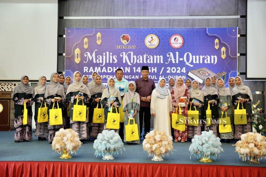  Mohamad and his wife with some o the participants in the ‘Majlis Khatam Al-Quran 2024’ organised by the Negri Sembilan Women's Organisation ( (NSWO) in Seremban today. Pic courtesy of NSWO.
