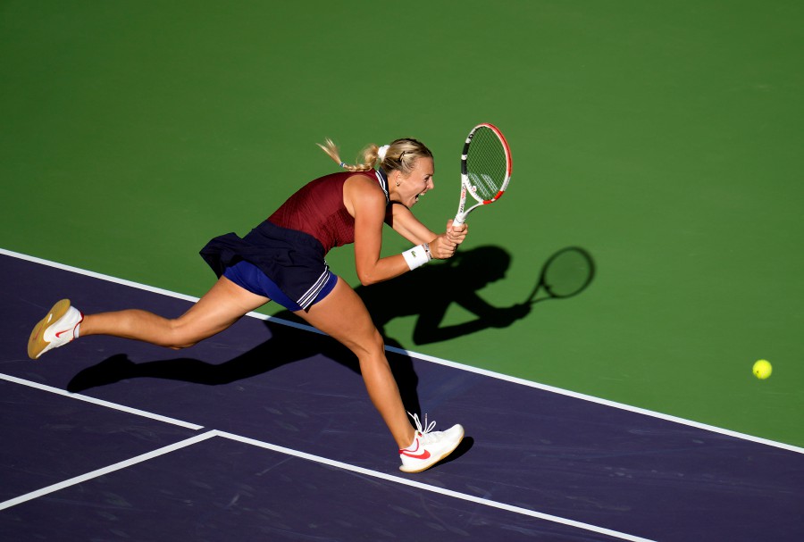  Anett Kontaveit of Estonia in action against Ons Jabeur of Tunisia during their match at the BNP Paribas Open tennis tournament at the Indian Wells Tennis Garden in Indian Wells, California. - EPA PIC