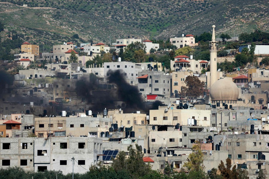 Smoke billows in the Palestinian refuge camp of al-Fara, in the occupied West Bank. - AFP PIC