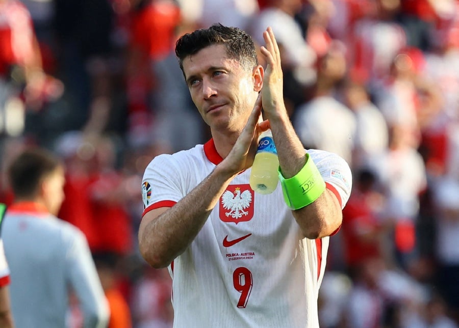 Poland’s Robert Lewandowski looks dejected after the Euro 2024 Group D loss to Austria on Friday. - REUTERS PIC