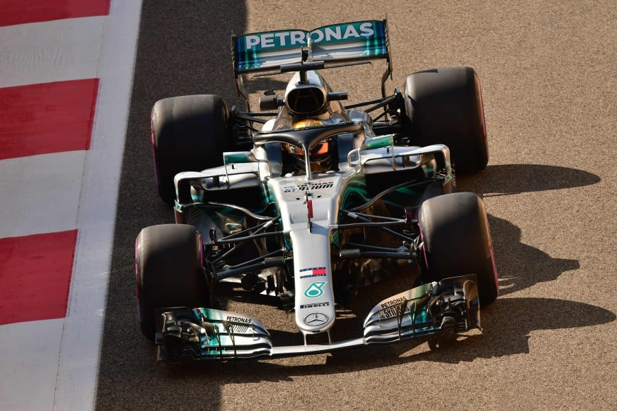 Mercedes' British driver Lewis Hamilton steers his car during the first practice session at the Yas Marina circuit on November 23, 2018, in Abu Dhabi, ahead of the Abu Dhabi Formula One Grand Prix. AFP 