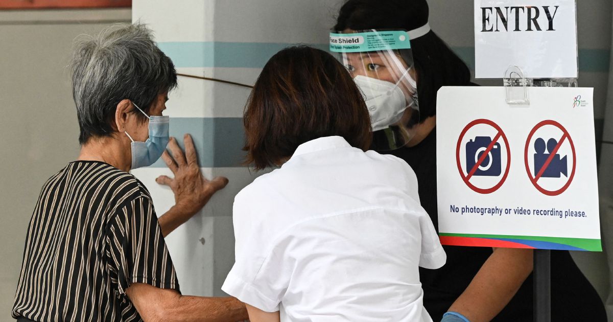 Singapore's daily Covid-19 cases hit record of more than 26,000
