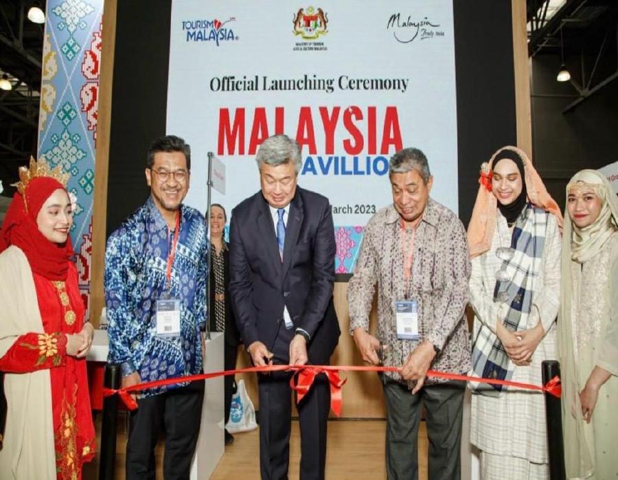 Malaysian ambassador Cheong Loon Lai (third from left) and Iskandar Mirza Mohd Yusof (third from right) at the launch of the Malaysia Pavilion at the International Travel & Hospitality Show in Moscow.- Pic courtesy of the writer