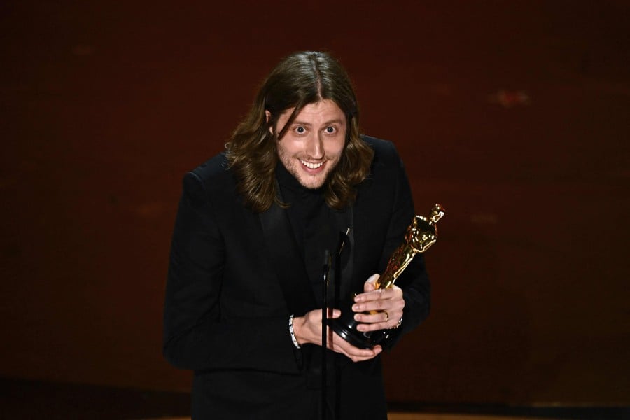Swedish composer Ludwig Goransson accepts the award for Best Original Score for "Oppenheimer" onstage during the 96th Annual Academy Awards at the Dolby Theatre in Hollywood, California. - AFP PIC